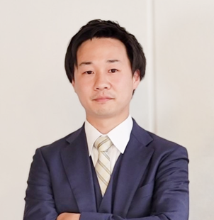 理事 新谷 俊